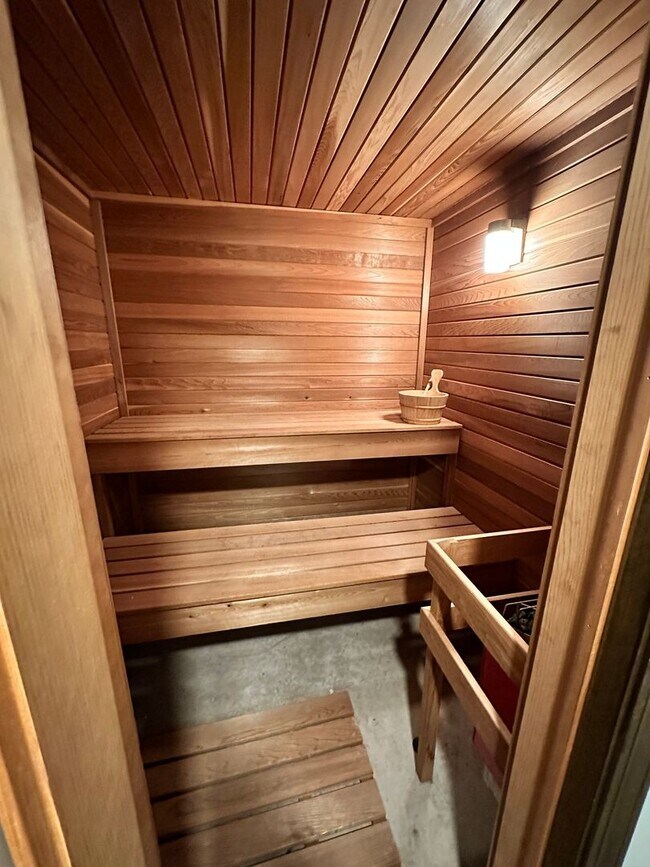 Building Photo - Dream Home in Highland, Michigan: Your Private Oasis on 5 Wooded Acres