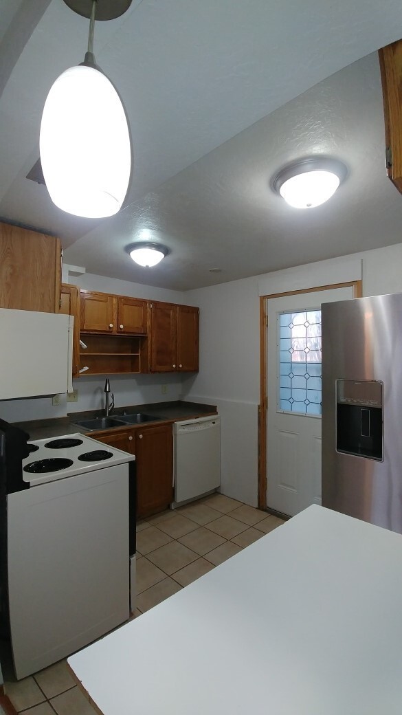 Building Photo - Home in Lolo with Fenced Yard and Pets Considered