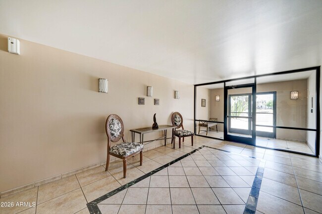 Building Photo - 7940 E Camelback Rd