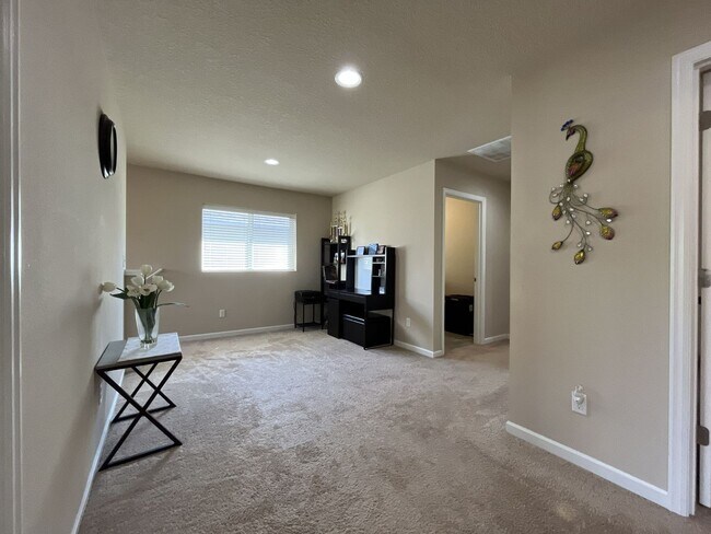 Building Photo - Stunning 4 Bedroom + Loft Bethany Home with Open Layout, Stainless Steel Kitchen, Two Car Garage ...