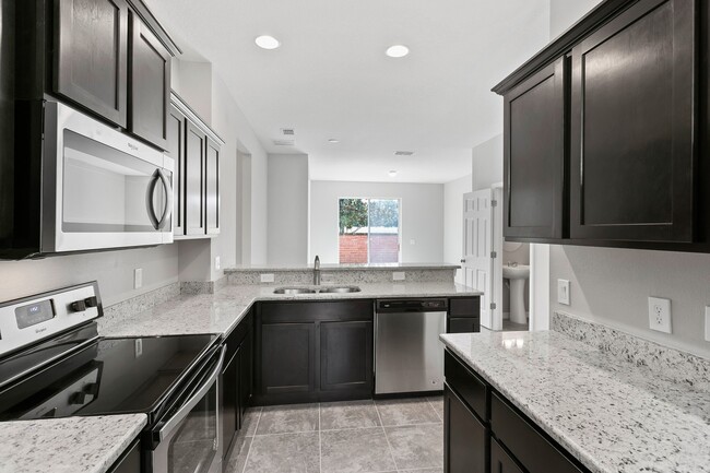 Building Photo - 4/2.5 Beautiful Energy Efficient Townhome ...