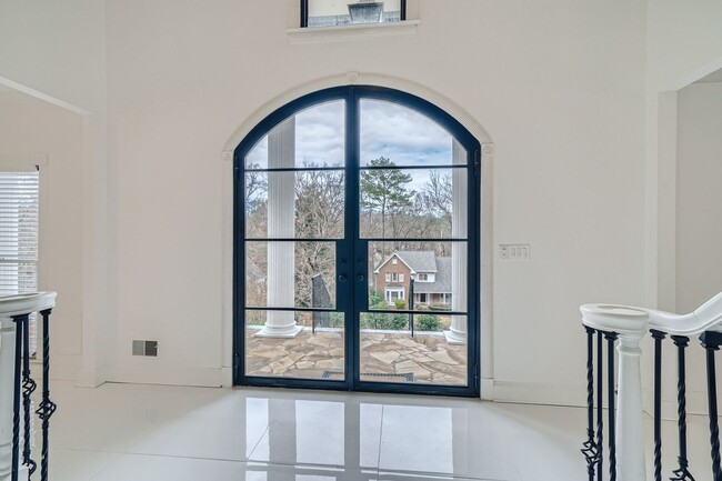 Building Photo - Furnished Estate Home - Double Curved Stairway - Marble Floors - Waterfall Island
