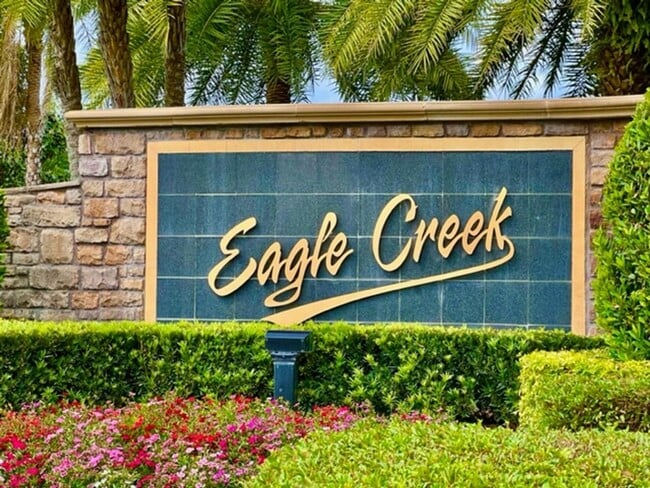 Building Photo - EAGLE CREEK LAKE NONA! WELCOME HOME! Beautiful water views! Spacious 2 story-3 bedroom 2.5 bath h...