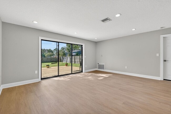 Building Photo - Fully Remodeled 3BR Home with Large Fenced Yard & New Deck