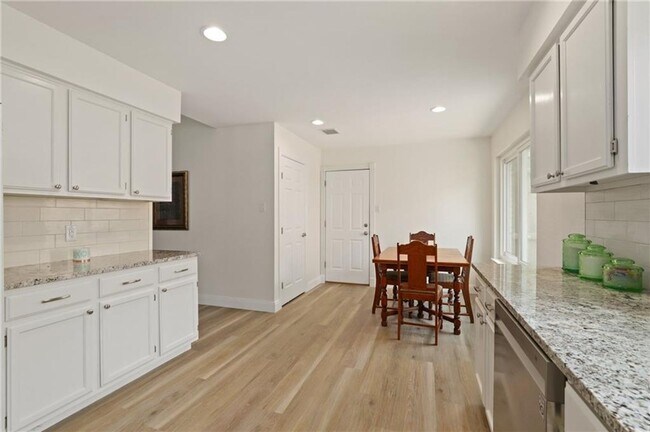 Building Photo - 4-bedroom, 1-story home with dedicated office space and large backyard!