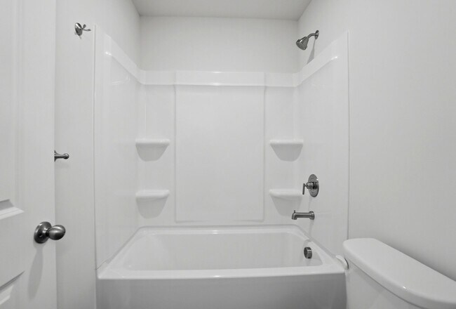 Building Photo - 4BR Home in The Pines at Paw Creek – New Construction + Private Deck