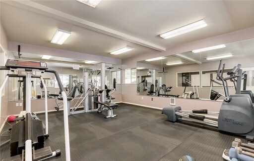 Building Photo - Lovely Condo in the Woods - Deck - Carport - FP - Closets - WD/DW - Fitness Center - Pools