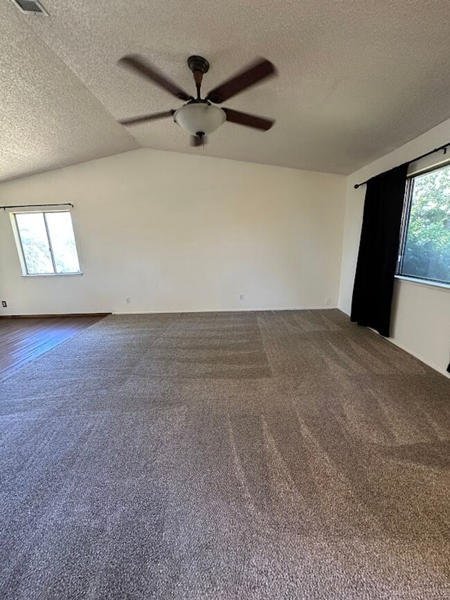 Building Photo - Well maintained home on 1.14 acres - Landscaping included!
