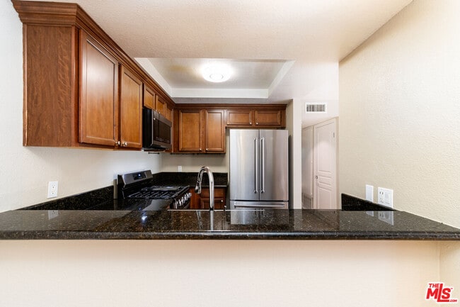 Building Photo - 1633 S Bentley Ave