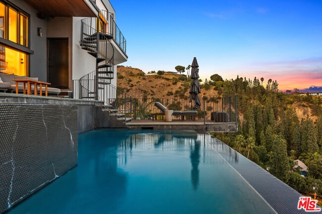 Building Photo - 8425 Hillside Ave