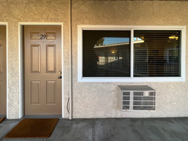 Condo's front door - 3010 Montrose Ave