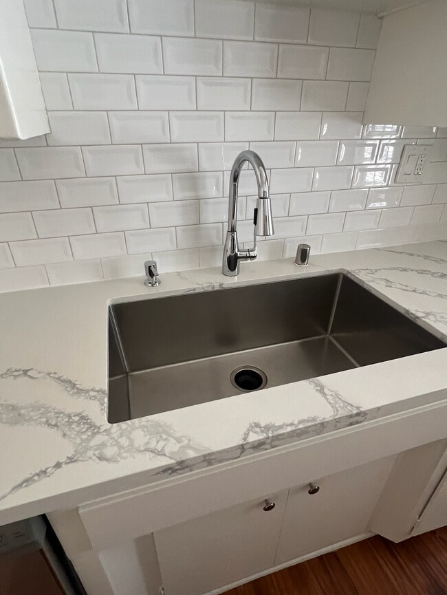 Kitchen new countertop and faucet - 550 N Serrano Ave