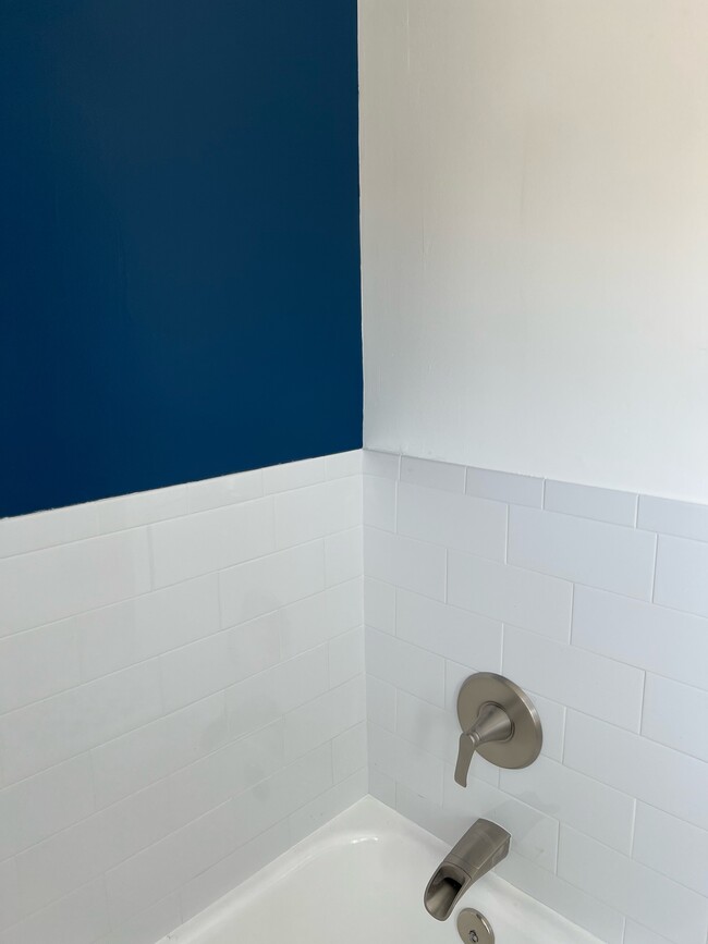 Bathroom with tub and shower - 1242 Devon Ave