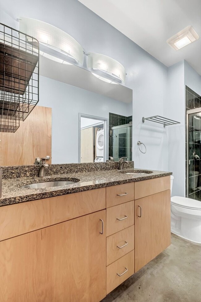 Building Photo - Beautiful 2-bedroom loft with garage parking, and community room with swimming pool!