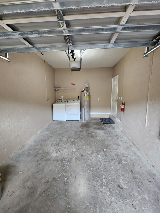 Spacious garage with Washer/dryer - 5036 SE Mariner Garden Cir