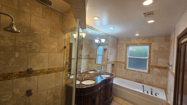 Building Photo - Exquisite 4 Bedroom + Office Single-Level Residence with Pool/BBQ in a Prime South-of-the-Bouleva...