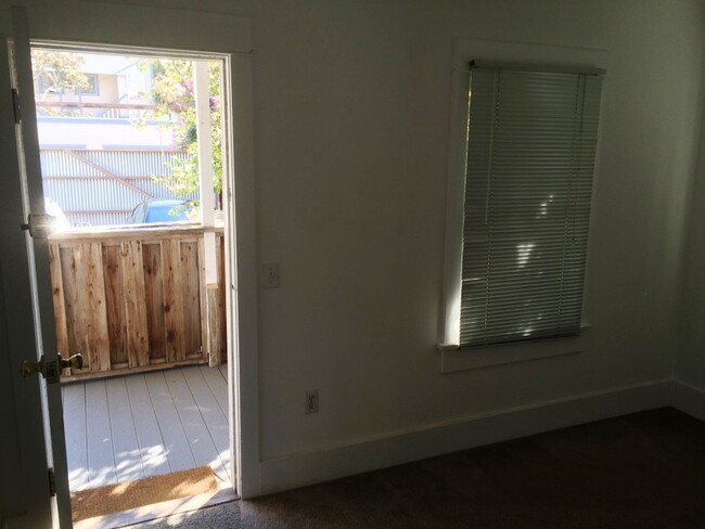 Back of bedroom with patio - 210 Horizon Ave