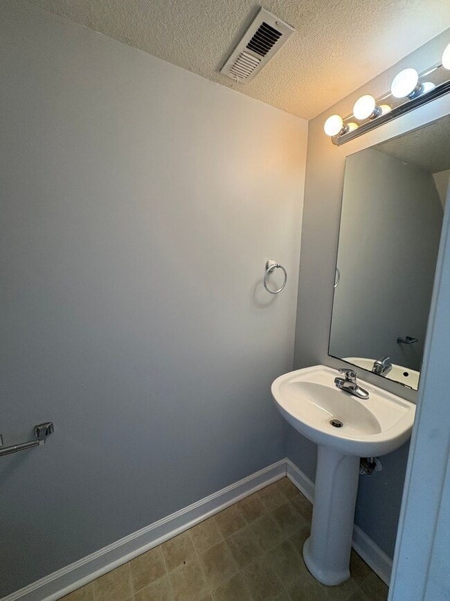 Building Photo - Charming two bedroom one and a half bath town home that is centrally located. Just a short drive ...