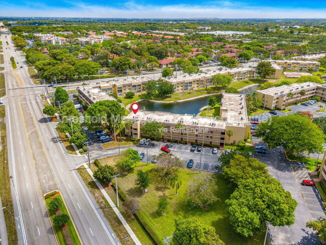 Building Photo - 6090 NW 64th Ave