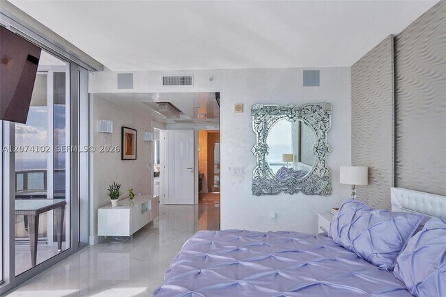 Building Photo - 17121 Collins Ave