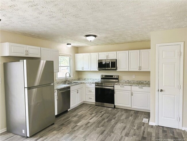 Building Photo - 4938 Tangerine Dr