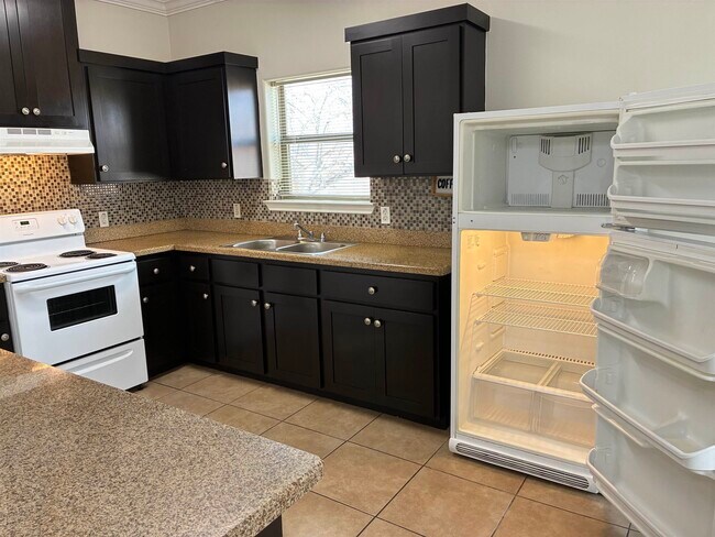 Building Photo - 5402 Marcella Ave