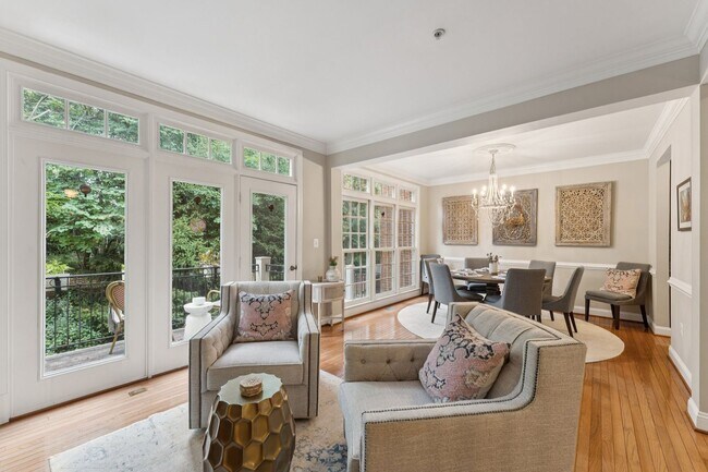 Building Photo - Discover this stunning four-level townhous...