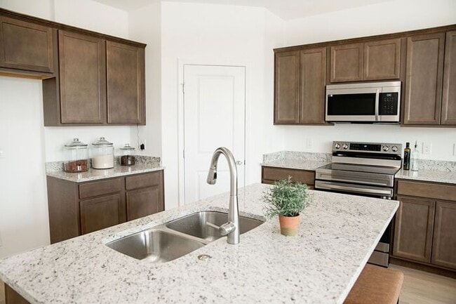 Building Photo - $1,000 MOVE-IN CREDIT! Stunning 3-Bed, 2.5-Bath Townhome at The Lily at Clover Ridge