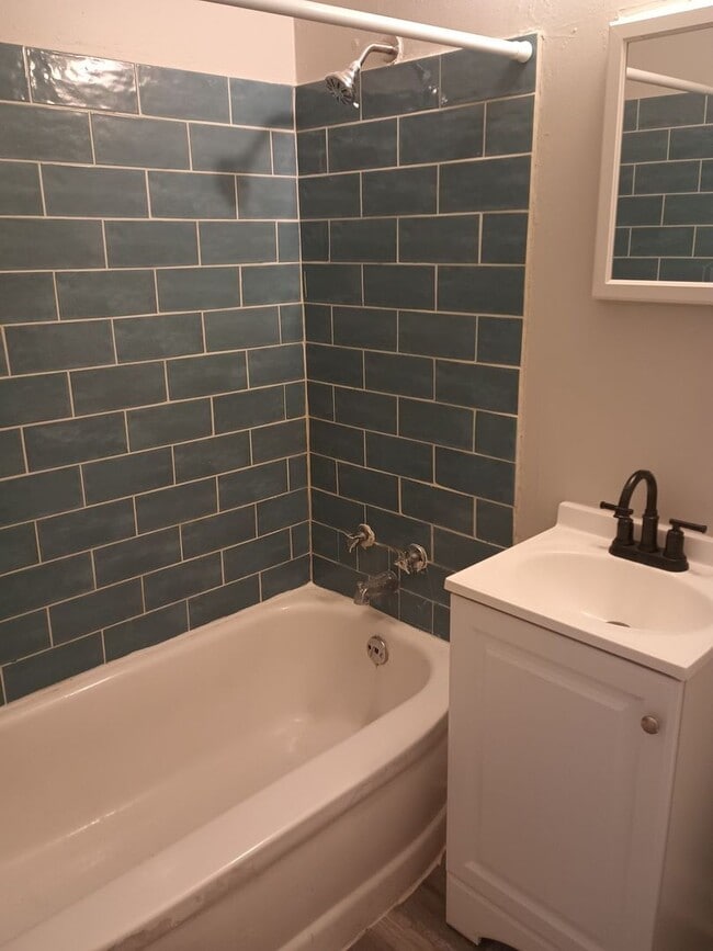 Building Photo - Coming Soon: Charming & Light-Filled 2-Bedroom Duplex!