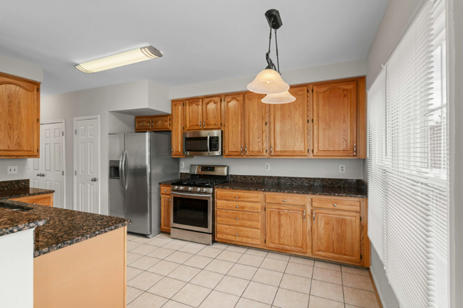 Building Photo - 7073 Kings Manor Dr