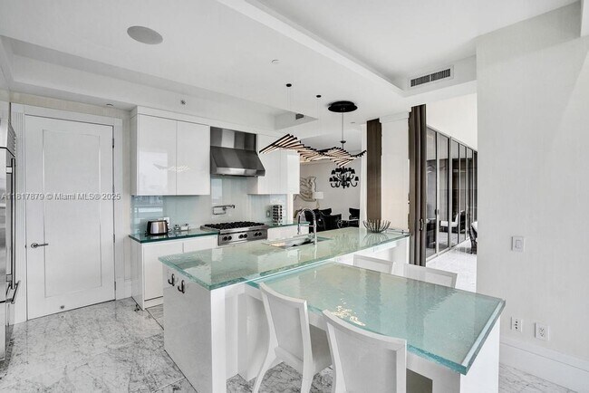 Building Photo - 9705 Collins Ave