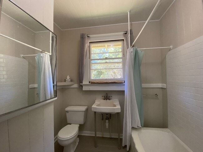 Building Photo - Furnished Plantation Home with 3 Bedrooms, 2 Bath large enclosed porch on almost 2 acres with oce...