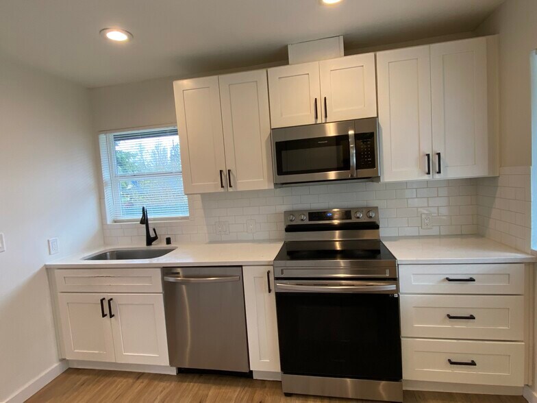 Building Photo - 10448 2nd Ave SW