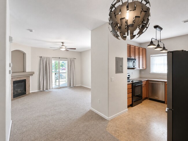 Building Photo - Spacious 2-Bedroom Condo with Garage, Fireplace, Pool & Most Included Utilities