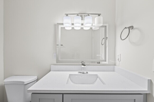 Building Photo - "Charming 2-Bedroom Townhouse Retreat with...