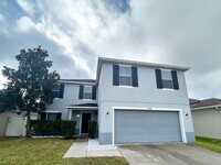 Building Photo - Luxurious 4/2.5 Modern Home with a Fenced ...