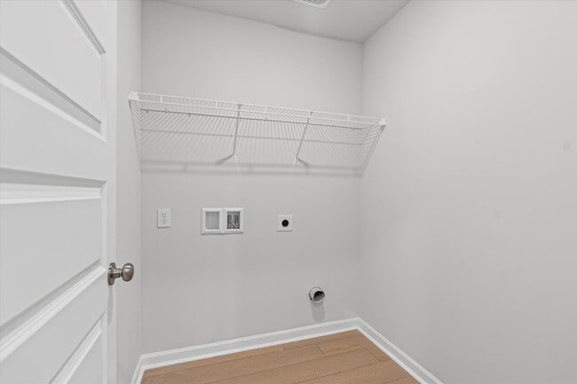 Building Photo - New 4BR Home in Whispering Woods – Spaciou...