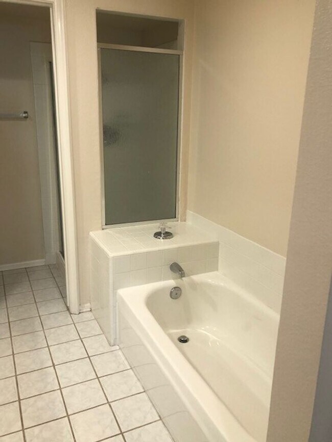 Building Photo - Remodeled 2-Bed, 2-Bath Condo with Garage ...