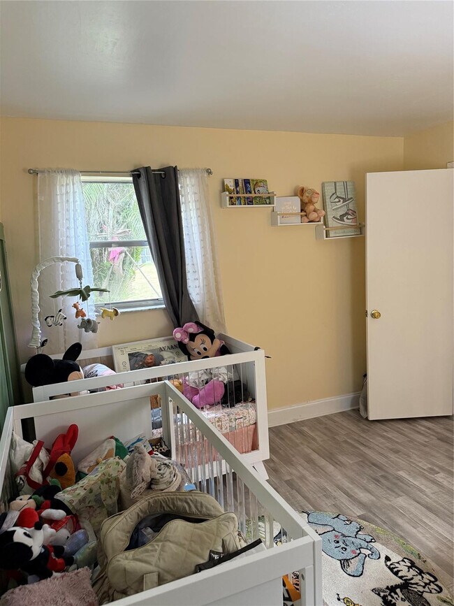 Building Photo - 7355 Woodmont Terrace