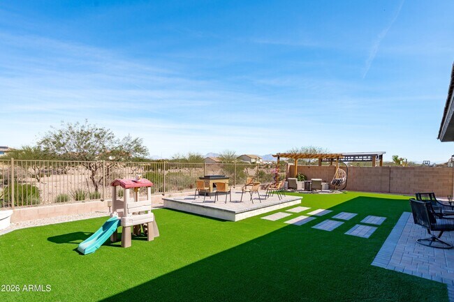 Building Photo - 10812 E Tesla Ave