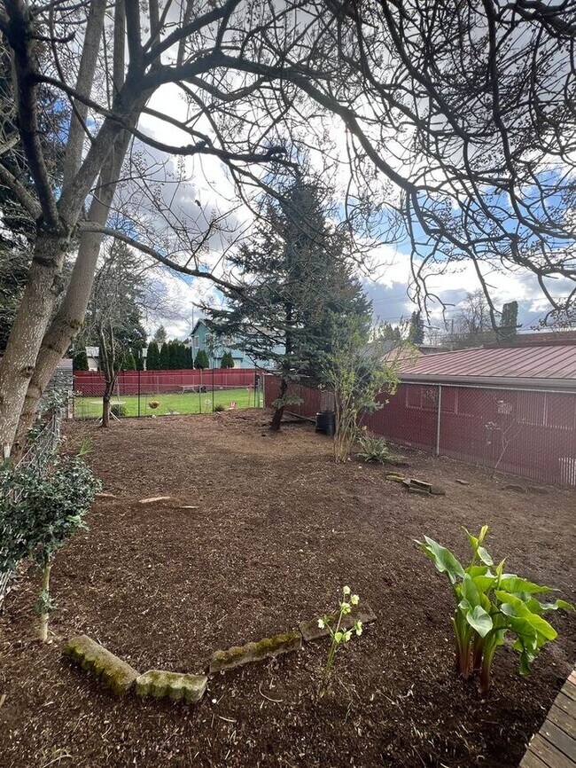 Building Photo - Your Mt. Tabor Oasis: Huge Yard, Oversized Shop-Garage & Sun-Drenched Living!