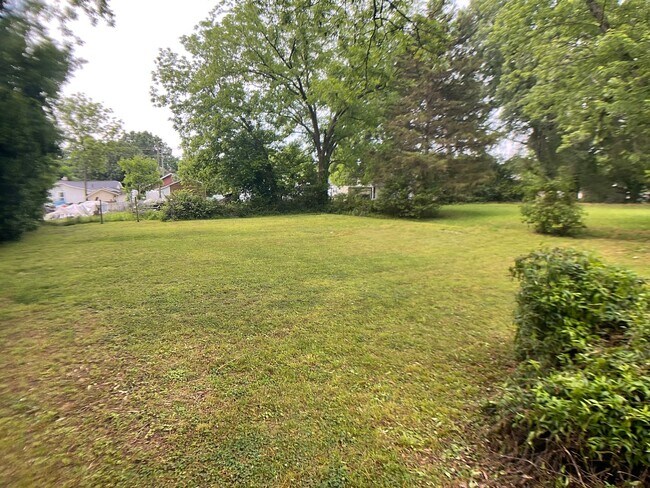 Building Photo - Adorable, Renovated Bungalow with Huge Yard and Deck!