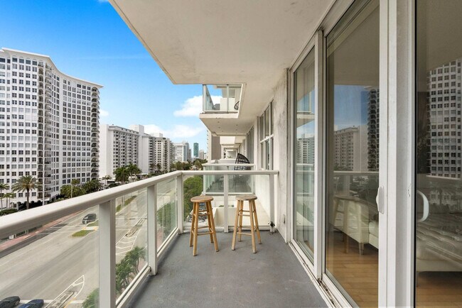 Building Photo - 5599 Collins Ave