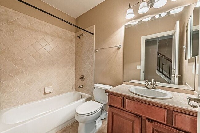 Building Photo - Stunning 5BR Home with Luxury Master Suite & Low-Maintenance Yard!