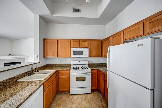 Building Photo - Second Story Condo with Open Floor Plan and Granite Counters