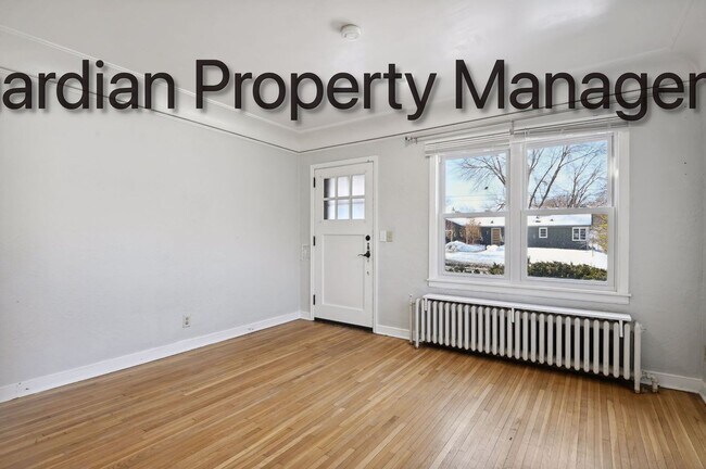 Building Photo - Linden Hills Side By Side, Hardwood Floors, Attached Garage, New Efficient Heating System, Pets W...