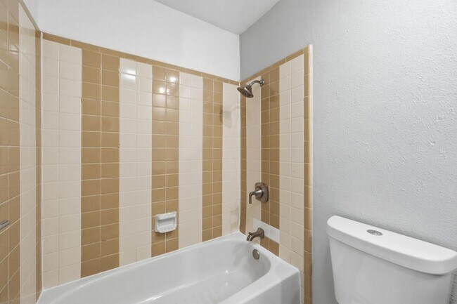 Building Photo - Charming 3-Bed Brick Home with Spacious Layout, Updated Floors & Cozy Fireplace in Grand Prairie