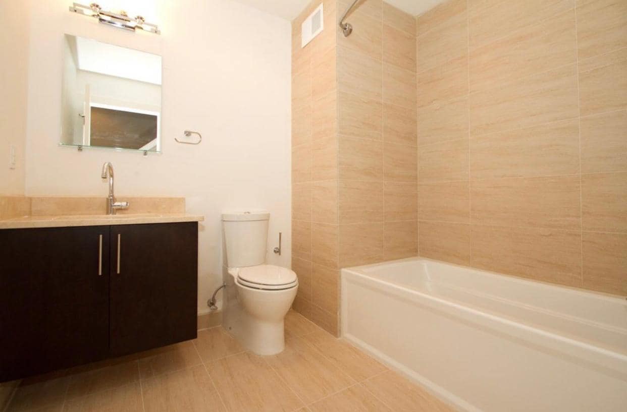 Guest Bathroom (In hallway between East and West bedrooms) - 919 N 5th St