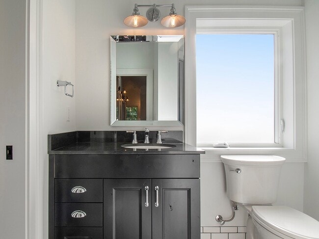 Building Photo - Expansive Loft-Style Carriage House in Private Haller Lake Estate