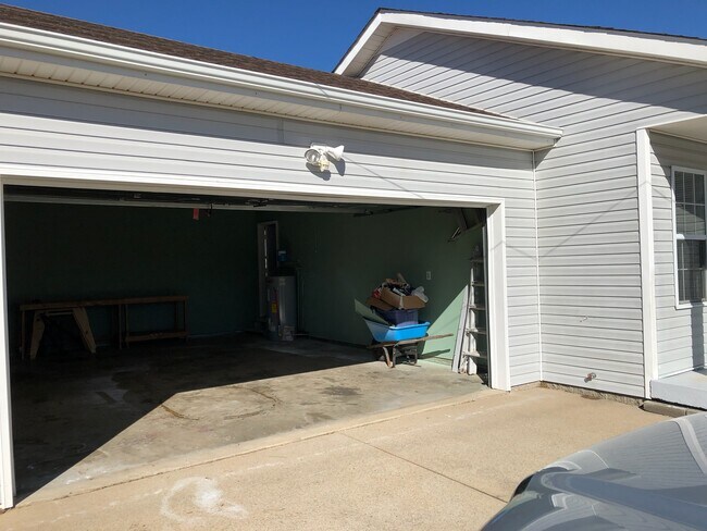 2 car garage with lots of storage and room to keep your vehicles out of the elements! - 101 Bowers Ct